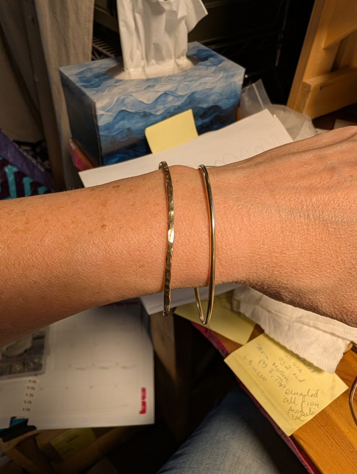 Handmade brass bangles in hammered and smooth round finishes