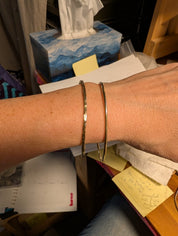 Handmade brass bangles in hammered and smooth round finishes