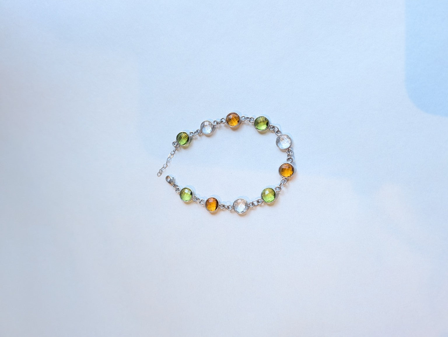 Full view of Here Comes Spring citrine peridot and clear quartz bracelet