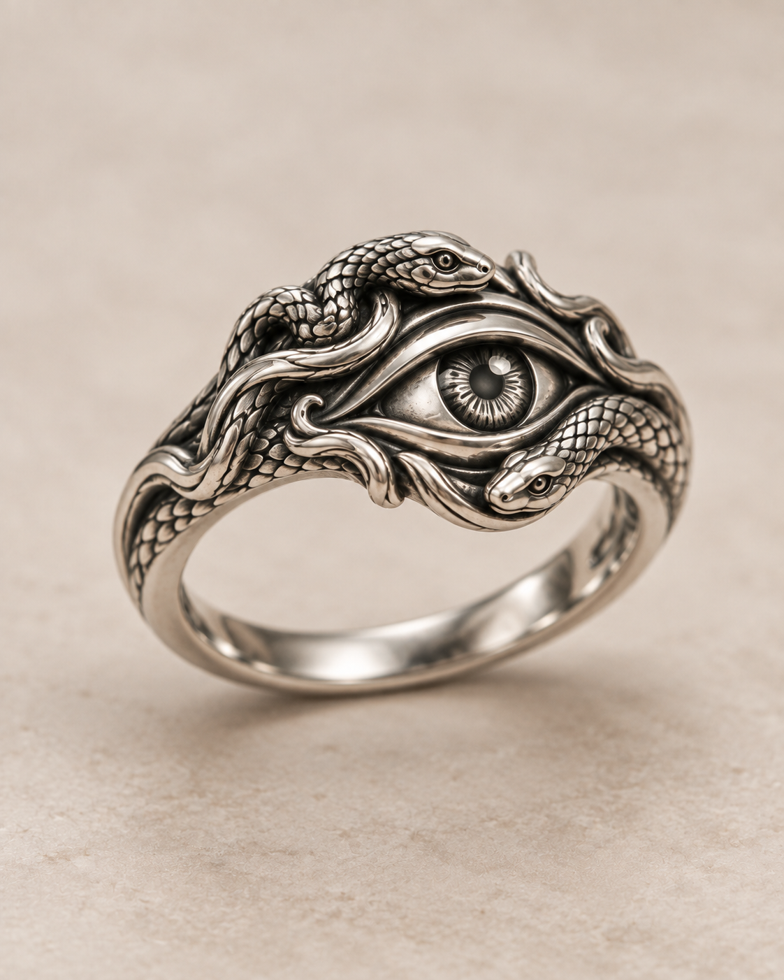 The Gaze Medusa Eye Ring in sterling silver with sculpted serpents