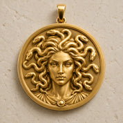 Medusa Pendant in 14K yellow gold front view with sculptural snake hair