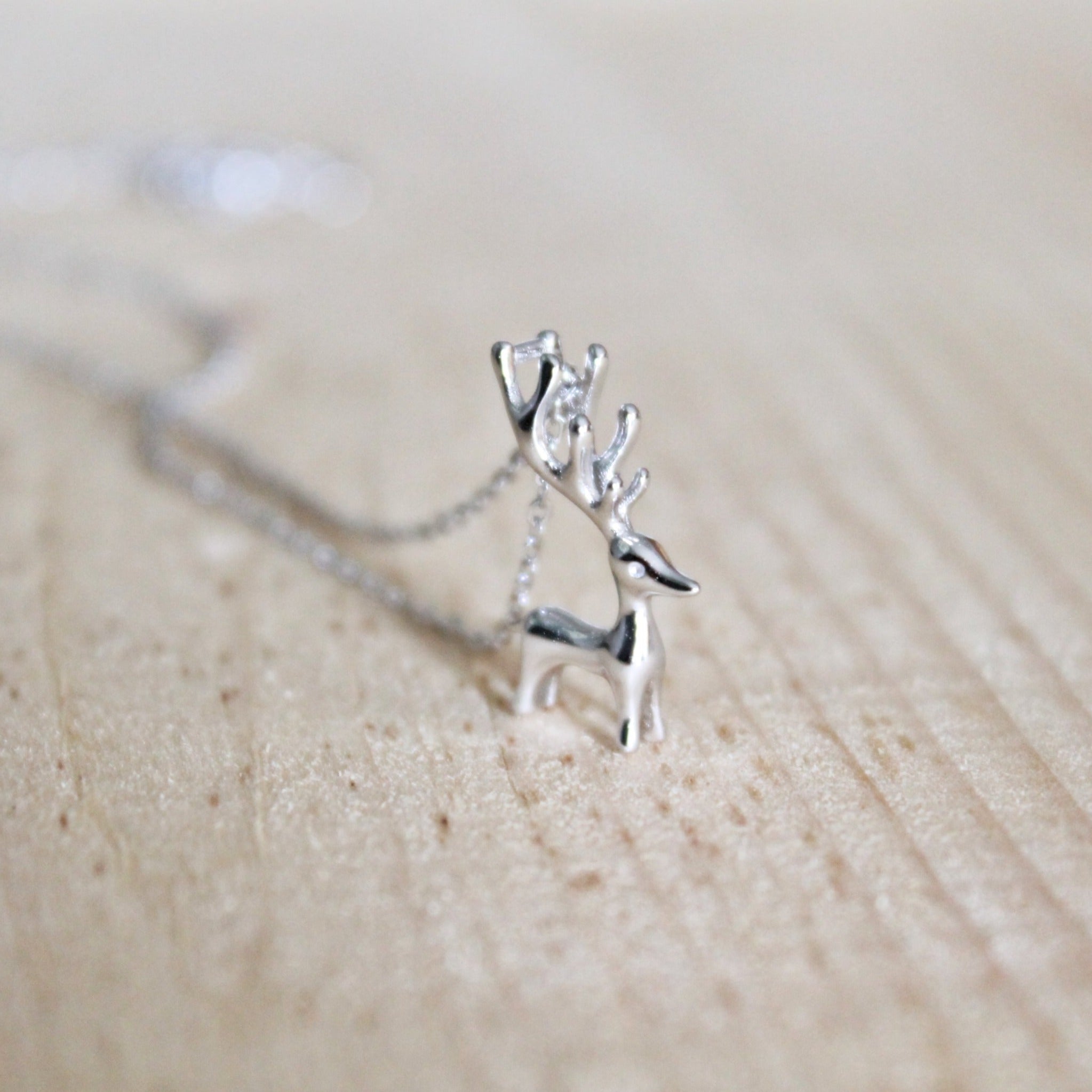 Standing Reindeer Figurine Necklace in Sterling Silver