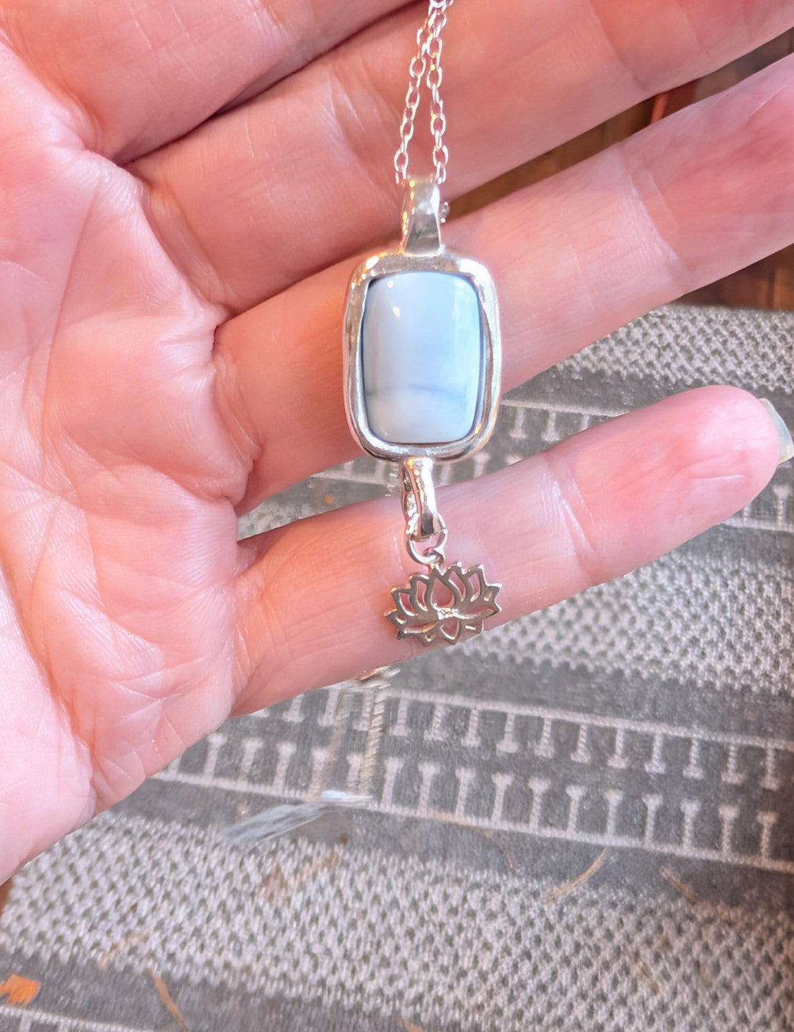 Night Lotus necklace with blue opal and lotus charm in sterling silver