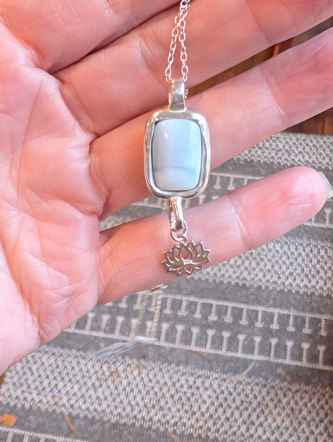 Night Lotus necklace with blue opal and lotus charm in sterling silver