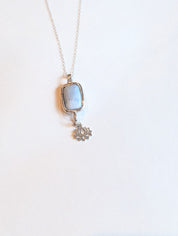 Night Lotus blue opal necklace on white background