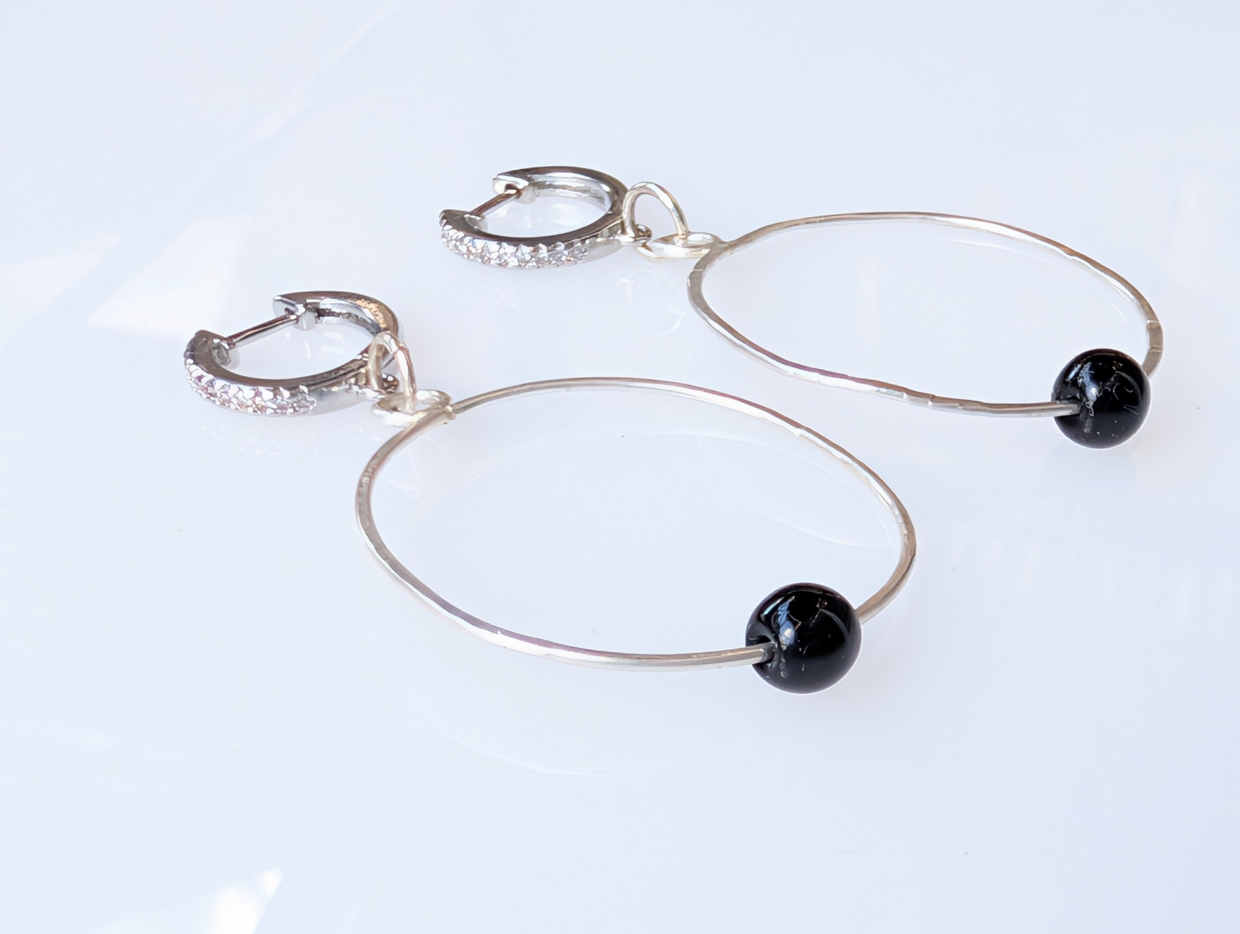Night Current Hoops | Sterling silver hoop earrings with black spinel • The Night Sea Collection
