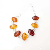 Helia’s Tears Bracelet | Sterling Silver Baltic Amber Bracelet | Tears of the Sun