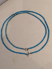 Handmade turquoise necklaces in two lengths with sterling silver toggle clasps