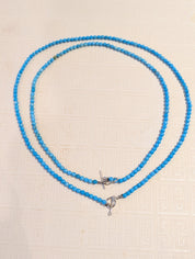 Layered 4mm turquoise bead necklaces with sterling silver toggle clasps